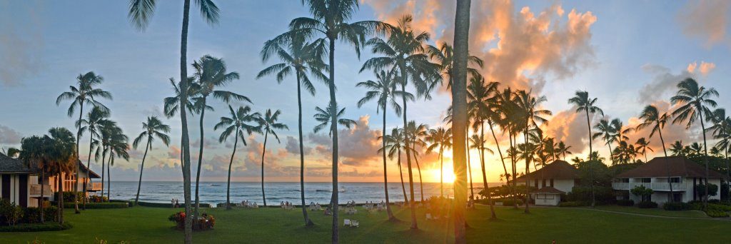 Sunset view of the ocean from the private lanai at Kiahuna 22, a beachfront condo at Kiahuna Plantation, Poipu, Kauai